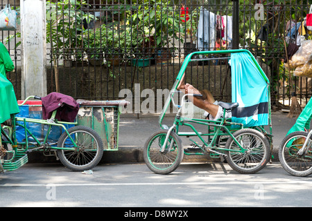 Tricycle in Malate District in Manila, Philippines Stock Photo