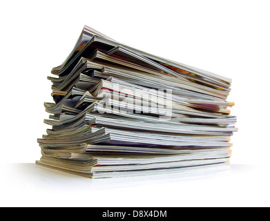 Closeup of a messy pile of old magazines with bending pages Stock Photo