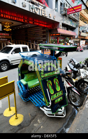 Tricycle in Malate District in Manila, Philippines Stock Photo