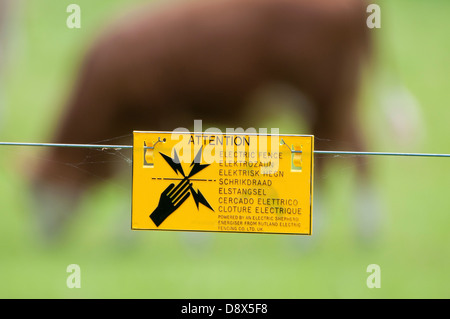 electric fence warning sign, norfolk, england Stock Photo