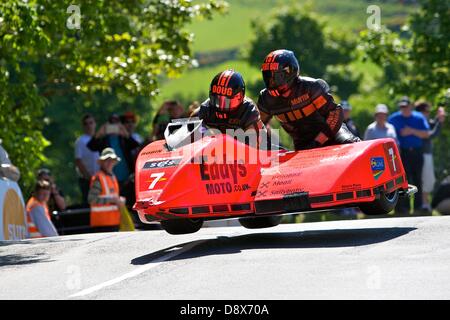 Isle of Man, UK. 5th June, 2013. Douglas Wright and Martin Hull during the Sure Sidecar race at the Isle of Man TT. Stock Photo