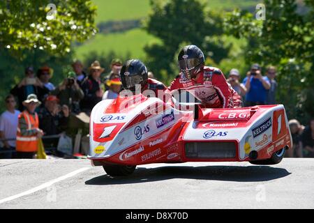 Isle of Man, UK. 5th June, 2013. Dave Molyneux and Patrick Ferrance during the Sure Sidecar race at the Isle of Man TT. Stock Photo