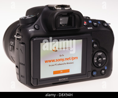 Sony Alpha 58 digital system camera - startup screen advertises website URL. Stock Photo
