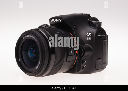 Sony Alpha 58 digital system camera - camera with 18-55mm lens. Stock Photo