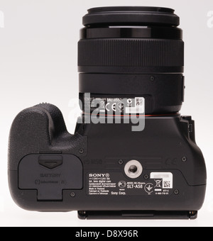 Sony Alpha 58 digital system camera - baseplate with information, Made in Thailand. Stock Photo