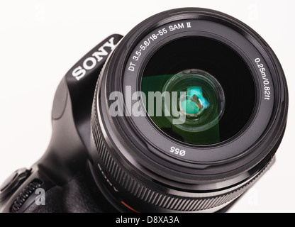Sony Alpha 58 digital system camera - 18-55mm lens front glass with optical coating. Stock Photo