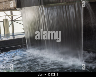 curtain of water inside shaw conference centre Stock Photo