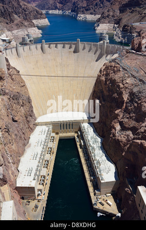 Hoover Dam with Lake Mead in Background and Colorado River in Foreground Stock Photo