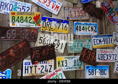 Old License plates on wall in Bar Harbor, Maine. Stock Photo