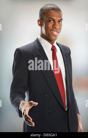 African American businessman offering handshake isolated indoors Stock Photo