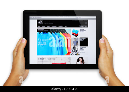 Armani Exchange apparel online store website on iPad Stock Photo