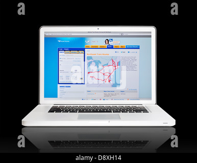 Amtrak routes website on laptop screen - Northeast train routes Stock Photo