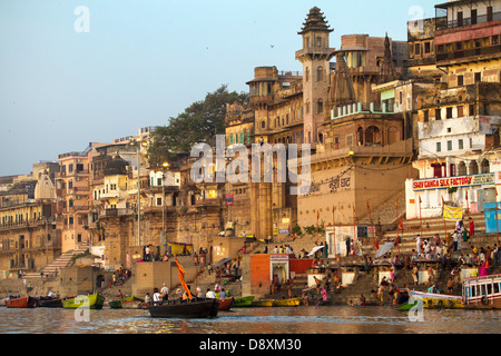 Ghats on the banks of Ganges river in holy city of Varanasi Stock Photo