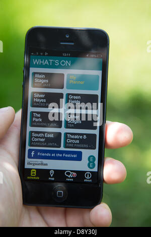 London, UK. 6th June, 2013. A new Glastonury Festival phone app went live today. The app, which has been built by EE, is the only official mobile app for this year's Festival. It's available for devices using Apple iOS and Android. Download the app (whatever network you're on) and you’ll be able to see who’s playing where, with full stage listings from the Guardian Guide. Once the full line-up timings are announced, you'll even be able to make your own schedule and set reminders.   Credit:  Ed Stone/17�Թ����� Live News Stock Photo