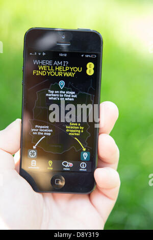 London, UK. 6th June, 2013. A new Glastonury Festival phone app went live today. The app, which has been built by EE, is the only official mobile app for this year's Festival. It's available for devices using Apple iOS and Android. Download the app (whatever network you're on) and you’ll be able to see who’s playing where, with full stage listings from the Guardian Guide. Once the full line-up timings are announced, you'll even be able to make your own schedule and set reminders.   Credit:  Ed Stone/17�Թ����� Live News Stock Photo