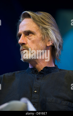 Jeremy Irons reading poetry of The Great War on stage at Hay Festival 2013 Hay on Wye Powys Wales UK Stock Photo