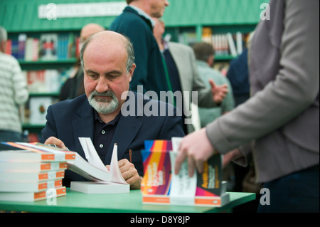 Nassim Nicholas Taleb, Lebanese American essayist and scholar, pictured book signing at Hay Festival 2013 Hay on Wye Powys Wales Stock Photo