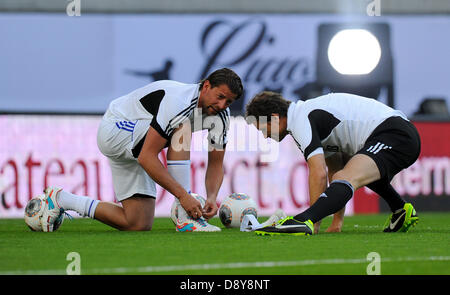 Roman Weidenfeller (l) with Jens Lehmann is pictured during Michael Ballack's farewell match at Red Bull Arena in Leipzig, Germany, 05 June 2013. Photo. Thomas Eisenhuth Stock Photo