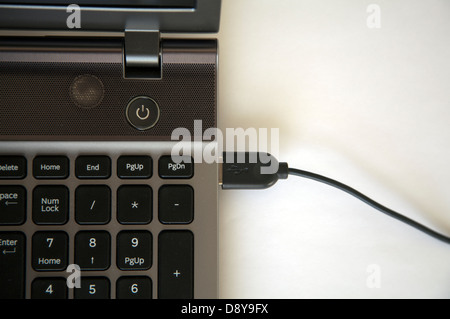 Laptop Keyboard Power Button and USB Port Attached Stock Photo