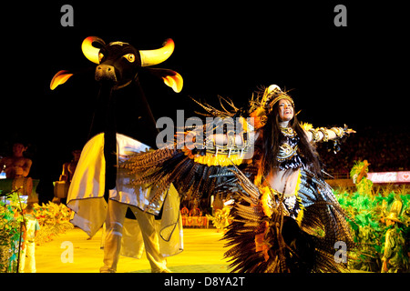 Boi-Bumbá Festival. Team Caprichoso, a dancer with feather ornaments with Caprichoso ox Stock Photo