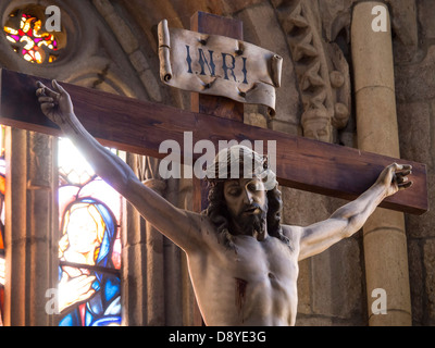 Ancient statue of crucified Jesus Christ Stock Photo