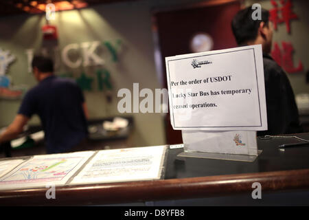 June 6, 2013 - Boston, Massachusetts, USA - A sign at the Lucky Star bus company counter on Thursday, June 6, 2013 at South Station in Boston, Massachusetts tells passengers that operations were ceased. The Lucky Star bus company which runs multiple trips to and from New York to Boston was ordered to stop operations this week by the Department of Transportation. The Fung Wah bus company which also which runs multiple trips to and from New York to Boston was ordered to cease operations in Feburary. (Credit Image: © Nicolaus Czarnecki/METRO US/ZUMAPRESS.com) Stock Photo