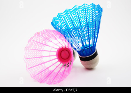 pink and blue badminton shuttlecocks on a white background Stock Photo