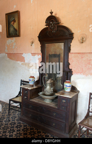 Colonial era antique dresser in the main building at Hacienda Yaxcopoil, Yucatan, Mexico Stock Photo