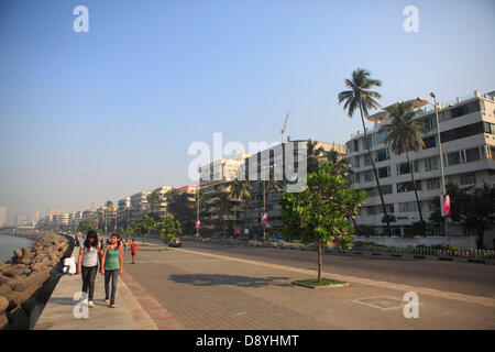 Dec 01, 2012 - Mumbai, Maharashtra, India - Marine Lines Neighborhood where many Art Deco Buildings are located. Art Deco buildings in Mumbai, India have found a new legion of fans after a stretch of structures built in the 1920s, 30s and 40s became last year one of two Indian bids to be declared as a Unesco World Heritage Site. Mumbai has one of the largest concentrations of original and surviving Art Deco edifices in the world, second only to Miami. Deco buildings cropped up at a time of exuberant optimism and opulence in Mumbai. The Art Deco style in Mumbai was characterized by elegant feat Stock Photo