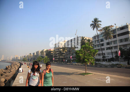 Dec 01, 2012 - Mumbai, Maharashtra, India - Marine Lines Neighborhood where many Art Deco Buildings are located. Art Deco buildings in Mumbai, India have found a new legion of fans after a stretch of structures built in the 1920s, 30s and 40s became last year one of two Indian bids to be declared as a Unesco World Heritage Site. Mumbai has one of the largest concentrations of original and surviving Art Deco edifices in the world, second only to Miami. Deco buildings cropped up at a time of exuberant optimism and opulence in Mumbai. The Art Deco style in Mumbai was characterized by elegant feat Stock Photo