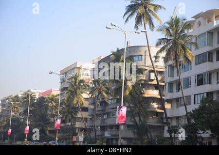 Dec 01, 2012 - Mumbai, Maharashtra, India - Marine Lines Neighborhood where many Art Deco Buildings are located. Art Deco buildings in Mumbai, India have found a new legion of fans after a stretch of structures built in the 1920s, 30s and 40s became last year one of two Indian bids to be declared as a Unesco World Heritage Site. Mumbai has one of the largest concentrations of original and surviving Art Deco edifices in the world, second only to Miami. Deco buildings cropped up at a time of exuberant optimism and opulence in Mumbai. The Art Deco style in Mumbai was characterized by elegant feat Stock Photo