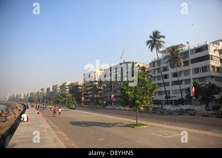 Dec 01, 2012 - Mumbai, Maharashtra, India - Marine Lines Neighborhood where many Art Deco Buildings are located. Art Deco buildings in Mumbai, India have found a new legion of fans after a stretch of structures built in the 1920s, 30s and 40s became last year one of two Indian bids to be declared as a Unesco World Heritage Site. Mumbai has one of the largest concentrations of original and surviving Art Deco edifices in the world, second only to Miami. Deco buildings cropped up at a time of exuberant optimism and opulence in Mumbai. The Art Deco style in Mumbai was characterized by elegant feat Stock Photo