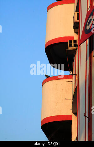 Dec 01, 2012 - Mumbai, Maharashtra, India - The Kotak Insurance Building at Mumbai is a classic example of Art Deco Style Architecture of the 1930s and 1940s. Art Deco buildings in Mumbai, India have found a new legion of fans after a stretch of structures built in the 1920s, 30s and 40s became last year one of two Indian bids to be declared as a Unesco World Heritage Site. Mumbai has one of the largest concentrations of original and surviving Art Deco edifices in the world, second only to Miami. Deco buildings cropped up at a time of exuberant optimism and opulence in Mumbai. The Art Deco sty Stock Photo