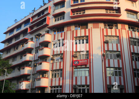 Dec 01, 2012 - Mumbai, Maharashtra, India - The Kotak Insurance Building at Mumbai is a classic example of Art Deco Style Architecture of the 1930s and 1940s. Art Deco buildings in Mumbai, India have found a new legion of fans after a stretch of structures built in the 1920s, 30s and 40s became last year one of two Indian bids to be declared as a Unesco World Heritage Site. Mumbai has one of the largest concentrations of original and surviving Art Deco edifices in the world, second only to Miami. Deco buildings cropped up at a time of exuberant optimism and opulence in Mumbai. The Art Deco sty Stock Photo