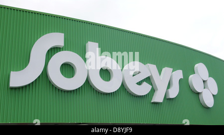 The Sobeys entrance in Sydney, Nova Scotia. This Sobeys store is built next to a stream coming from the Tar Ponds. Stock Photo