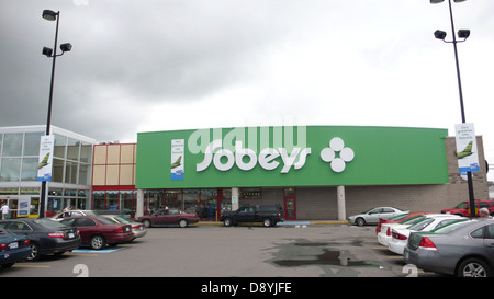 The Sobeys entrance in Sydney, Nova Scotia. This Sobeys store is built next to a stream coming from the Tar Ponds. Stock Photo