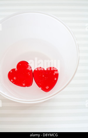 Heart-shaped strawberry jellies, close-up, Sweden. Stock Photo