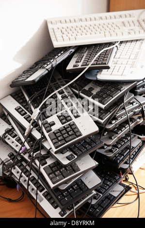 Pile of computer keyboards Stock Photo - Alamy