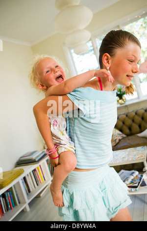 Sisters playing together. Stock Photo