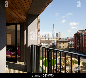 Library Street Affordable Housing, London, United Kingdom. Architect: Metaphorm Architects, 2012. Balcony with view of community Stock Photo