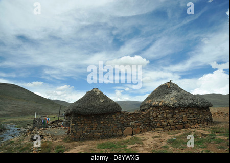 House, housing, ethnic, hut, traditional Basotho homestead, Lesotho countryside, landscape, Sani Pass, building, accommodation, abode, primitive Stock Photo