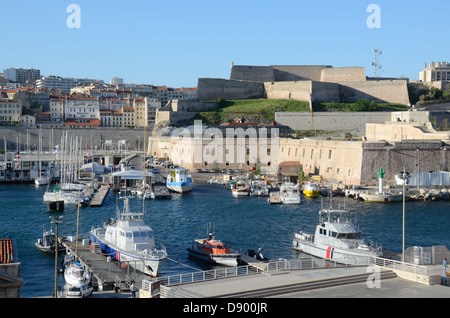 Coast Guard Boats and Saint Nicolas Fort or Fort Saint-Nicolas at Entrance to the Old Port or Vieux Port Marseille Provence France Stock Photo