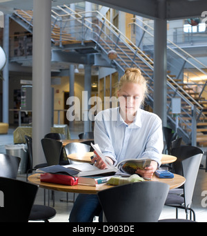 University student studying in cafe Stock Photo