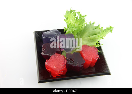 red and green jelly set in plastic cups on a tray in preparation for a  childrens party Stock Photo - Alamy