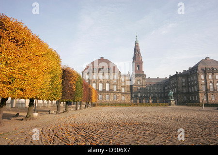 Autumn foliage in the park in front of the  Christiansborg Palace (Christiansborg Slot), Slotsholmen, Copenhagen, Denmark Stock Photo