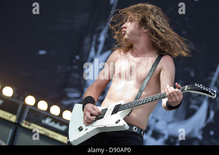 Nuremberg, Germany. 7th June 2013. Front man of Australian band Airbourne, Joel O'Keeffe (C), performs at the music festival 'Rock im Park' in Nuremberg, Germany, 07 June 2013. Over 70,000 rock musicians are expected to the festival which continues until 09 June. Photo: DANIEL KARMANN/dpa/Alamy Live News Stock Photo