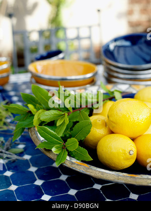 Lemons on a mosaic table, Sweden. Stock Photo