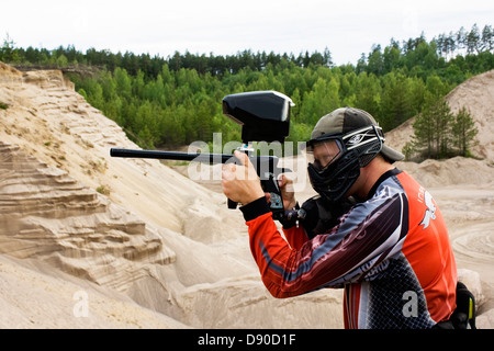 Men playing paintball, Sweden. Stock Photo