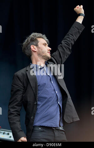 Nuremberg, Germany. 7th June 2013. Front man of German band Tocotronic, Dirk von Lowtzow, performs at the music festival 'Rock im Park' in Nuremberg, Germany, 07 June 2013. Over 70,000 rock musicians are expected to the festival which continues until 09 June. Photo: DANIEL KARMANN/dpa/Alamy Live News Stock Photo