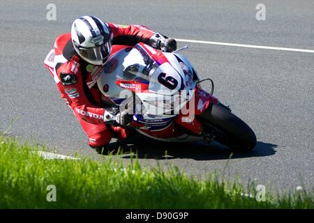Isle of Man, UK. 7th June, 2013.   Michael Dunlop on his Honda during the Pokerstars Senior TT race at the Isle of Man TT Stock Photo